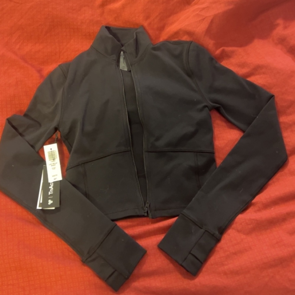 Tna relay waist zip up